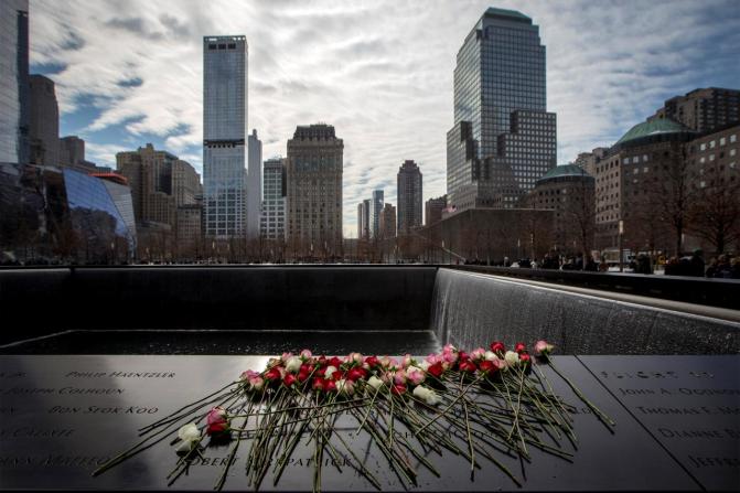 FILE PHOTO: Flowers cover the names of victims of  September 11 at the Memorial &amp; Museum at the World Trade Center site in New York